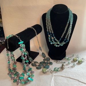 FOUR aqua, blue, green, and silver tone fashion necklaces